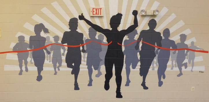 On a WMCA wall in Ithaca N.Y., I imagined I saw some of my former students in silhouette. This is the very wall.